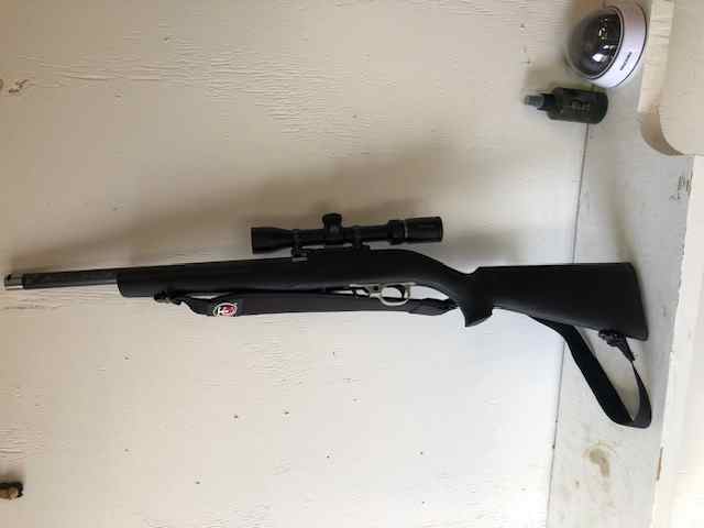 .22 ruger with hogue stock graphite barrel &amp; scope