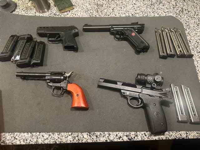 4 handguns